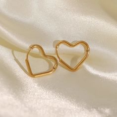 Gold heart earrings Gold Heart Earring, Dainty Hoop Earrings, Korean Jewelry, Heart Shaped Earrings, Steel Earrings, Jewelry Wholesale, Heart Studs, Heart Earrings Studs, Stainless Steel Earrings