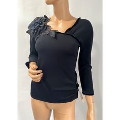 Elevate Your Wardrobe With This Stunning Black Blouse By Giorgio Grati. Crafted In Italy With High-Quality Polyester And Viscose, This Long-Sleeved Knit Top Features A Beautiful Embroidered Floral Design That Adds A Touch Of Elegance To Any Occasion. The Blouse Has A Relaxed Fit And A Wide Strap V-Neckline That Effortlessly Complements The Wearer's Figure. Perfect For Party, Cocktail, Formal, Business Occasions And The Winter, Fall And Spring Seasons, This Blouse Is A Must-Have For Every Fashion Elegant Spring Blouse With Floral Applique, Elegant Blouse With Floral Applique For Spring, Elegant Long Sleeve Tops With Floral Applique, Elegant Long Sleeve Blouse With Floral Applique, Chic Floral Embellished Tops For Party, Fitted Floral Applique Top For Parties, Evening Floral Embroidered Long Sleeve Blouse, Floral Embroidery Long Sleeve Tops For Evening, Long Sleeve Tops With Floral Embroidery For Evening