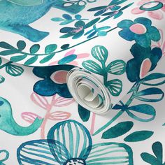 a close up view of a wallpaper with blue and pink flowers