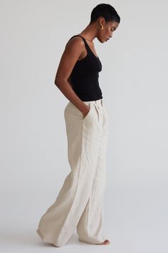 Elevate your summer style with these stylish linen trousers. Designed with elegance in mind, our tailored pants feature a high waist with an elasticated back, a straight leg, side pockets, and belt loops. Perfect for any occasion, these timeless pants are a must-have for every wardrobe. Wide Leg Linen Pants, Linen Trousers, Tailored Pants, Black Xs, Dress Trousers, Signature Collection, Linen Pants, Square Neckline, Summer Style