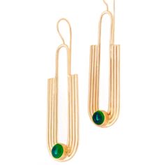 The modern yet elegant design is accented with green onyx gemstone on 18K yellow gold vermeil. Sweep your hair up to keep them in focus.This quality design is part of Mombasa CANDY ROCZ CollectionGreen onyx gemstones on18K yellow gold brass overlay Ear HooksDrop: 3.5" L. Modern Yellow Gold Jade Jewelry, Modern Emerald Gemstone Earrings, Modern Green Earrings With Polished Finish, Contemporary Gold Gemstone Jewelry, Modern Oval Jade Jewelry, Modern Earrings With May Birthstone Gemstone, Elegant Green Onyx Drop Earrings, Elegant Green Onyx Dangle Earrings, Elegant Green Onyx Gold Earrings