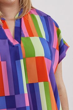 Colorblock Sleeveless Top • Multi Colorblocked v-neck sleeveless top featuring placket detail at neckline. Unlined. Woven. Non-sheer. Lightweight. 100%POLYESTER Multicolor V-neck Color Block Blouse, Multicolor V-neck Blouse For Work, Sleeveless Color Block Tops For Vacation, Multicolor V-neck Workwear Blouse, Summer Workwear Color Block Tops, Bold Multicolor Summer Blouse, Multicolor Sleeveless Tops For Work, Summer Color Block Blouse, Summer Multicolor Split Neck Tops