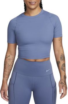 Narrow ribbing adds subtle texture to a slightly cropped top that's ready to elevate your casual look. Crewneck Short sleeves InfinaSoft lightweight fabric 78% nylon, 22% spandex Machine wash, tumble dry Imported Blue Crew Neck Crop Top For Sports, Sporty Ribbed Short Sleeve Crop Top, Athleisure Ribbed Crop Top With Crew Neck, Blue Casual Tops With Medium Support, Blue Ribbed Athleisure Tops, Casual Blue Tops With Medium Support, Blue Fitted Cropped T-shirt With Crew Neck, Blue Fitted Cropped T-shirt, Blue Fitted Crew Neck Cropped T-shirt