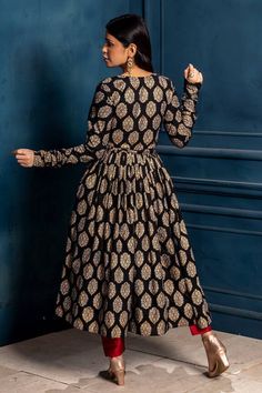 Black anagarakha with all-over hand block print floral motifs and side-tasselled dori detail. Comes with a pant. - Aza Fashions Black Long Sleeve Salwar Kameez With Printed Motifs, Anarkali Kurta For Fall Festive Occasions, Festive Fall Anarkali Kurta, Black Anarkali Set With Printed Motifs, Black Long Sleeve Kurta With Block Print, Black Long Sleeve Dress For Navratri, Black Straight Kurta Anarkali Set With Printed Motifs, Black Anarkali Set With Straight Kurta And Printed Motifs, Black Fitted Long Sleeve Anarkali Set