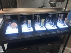 the display case has five different products on it