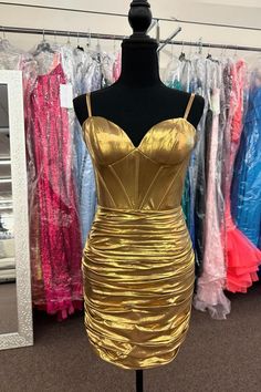 This dress is made of spandex material and features a beautiful gold color. The sheath silhouette, spaghetti straps, and ruched skirt add elegant details. With an above-the-knee length and a convenient zip-up back, this dress is both stylish and comfortable. SKU: 3667 Spandex material Gold color Sheath silhouette Spaghetti straps Ruched skirt Above knee length Zip-up back Highly suggest custom size for plus size. Ship in 7-10 business days. We offer free returns in 7 days. Please refer to our re Bodycon Dress Homecoming, Burgundy Prom Dress, Ruched Skirt, Formal Party Dress, Short Prom Dress, Luxury Wedding Dress, Dress Picture, Gold Dress, Homecoming Dress