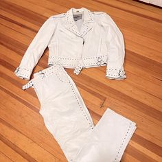 Unik White Leather Jacket Size Xl And White Leather Pants To Match Size 12. This Is A Great Combo That Was Much Fun To Wear On Occasions Be Great For Halloween Party. There Are A Couple Little Marks Being It Is White And Pre Owned But Over All Good Condition. White Leather Pants Women, Faux Leather Pants White, White Button Up Leather Pants, White Leather Moto Pants, White Leather Biker Outerwear, White Leather Moto Outerwear, White Leather Pants, White Leather Jacket, Leather Pants Women