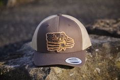 Our wildlife series is our introductory offering of premium leather patch hats. We start with fine top-grain leather that select in-person from our supplier and then dye in-house to assure color consistency. We then bond the leather by hand to Yupong or Richardson 112 brand original style snapback hats. Custom orders/colors available upon request and quantity discounts available (10+). Brown Waxed Finish Hat With Flat Brim, Brown Flat Brim Hat With Waxed Finish, Brown Leather Patch Snapback Hat With Curved Bill, Brown Leather Patch Snapback Hat, Leather Baseball Cap With Curved Bill For Outdoor, Brown Curved Brim Snapback Hat With Leather Patch, Leather Snapback Hat With Flat Bill And Leather Patch, Leather Snapback Hat With Leather Patch, Leather Snapback Cap With Leather Patch