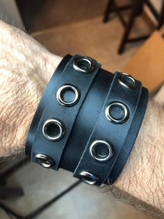 unisex-black-two-strap-leather-wrist-cuff-weyelets-1 - Boomers are Punk too Button Down And Jeans, Rock Punk Style, Leather Wrist Cuff, Rocker Outfit, Mode Punk, 7 Up, Punk Accessories, Punk Clothing, Modern Accessories