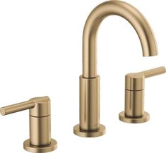 two faucets in brushed brass finish, one with handles and the other without handles