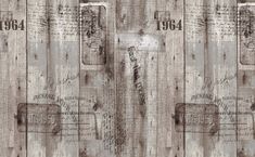 an old wooden wallpaper with some writing on the wood paneling in grey and white