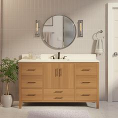 a bathroom with a sink, mirror and rug on the floor in front of it