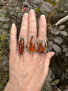 Sterling silver amber rings....very pretty amber stones and gorgeous silver work on these as well.  Very nice pieces for sure.  I've got a few different sizes and they are BEING SOLD INDIVIDUALLY APOINTER FINGER, SIZE 9 B...middle finger...size 9 C....ring finger....size 8.5 Bohemian Amber Sterling Silver Rings, Sterling Silver Amber Ring, Amber Rings, C Ring, Amber Ring, Amber Stone, Silver Work, Affordable Jewelry, Ring Finger