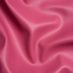 a pink leather textured background that looks like it has been made in the usa