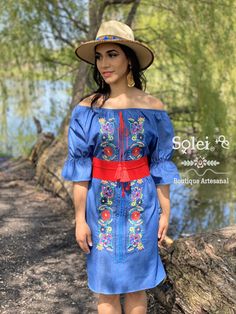 This Beautiful Off the Shoulder Mexican Campesino Dress is the perfect Spring & summer dress. It's lightweight with elastic around the shoulder, made out of a light jeans material and is full of vibrant colors.the belt shown with this dress is included.Denim floral dress Summer Floral Embroidered Off-shoulder Dress, Summer Off-shoulder Dress With Floral Embroidery, Summer Off-shoulder Floral Embroidered Dress, Off-shoulder Floral Embroidered Summer Dress, Knee-length Embroidered Dress For Summer, Bohemian Sundress With Floral Embroidery, Bohemian Embroidered Off-shoulder Summer Dress, Bohemian Off-shoulder Embroidered Summer Dress, Casual Embroidered Summer Festival Dress