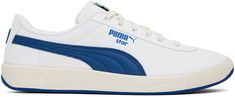 Canvas sneakers in white and blue. · Lace-up closure · Logo patch at padded tongue · Padded collar · Logo printed at outer side · Formstrip at sides · Logo patch at heel counter · Terrycloth lining · Logo embossed at textured rubber midsole · Treaded rubber sole Part of the Noah x Puma collaboration. Supplier color: Puma white/Clyde royal Low-top Sports Sneakers With Appliqué Logo, Low-top Sneakers With Appliqué Logo For Sports, High-top Sports Sneakers With Appliqué Logo, High-top Sneakers With Appliqué Logo For Sports, White Sports Sneakers With Appliqué Logo, Lace-up Sports Sneakers With Appliqué Logo, Lace-up Sneakers With Appliqué Logo For Sports, Sporty Sneakers With Appliqué Logo And White Sole, White High-top Sneakers With Appliqué Logo