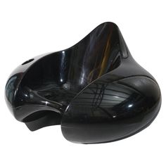 a pair of black shoes sitting on top of each other