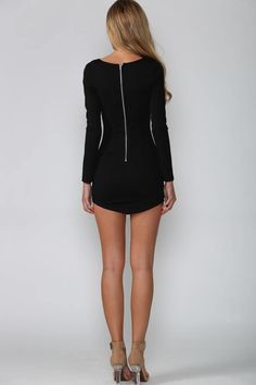 Long-sleeved black dress.Plunging V neckline.Wraparound neckline.Textured material.	Bodycon fit. Curved hem.Polyester.