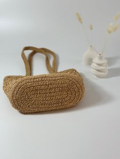 Summer Beige Crochet Bag Made Of Yarn, Beige Braided Crochet Bag, Everyday Braided Rattan Bag, Daily Use Braided Rattan Shoulder Bag, Summer Handwoven Crochet Bag Made Of Yarn, Brown Braided Crochet Beach Bag, Brown Braided Crochet Bag For Beach, Daily Use Braided Jute Bucket Bag, Braided Rattan Basket Shoulder Bag