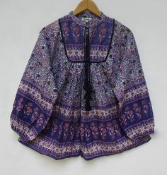 "ITEM DESCRIPTION gorgeous boho look printed cotton blouse and tops - long sleeve summer ethnic wear blouse - band round neckline women blouse tops Features : Long sleeve, split neck, Blouse Material : Cotton cambric Fabric: 100% cotton soft light weight ethnic print fabrics Sleeve Length = 22 inch For more sizes & their measurement, please refer our below chart to understand the sizes variations available with us For your size requirement, please mention your size in seller note at the time Indian Maxi, Crop Top Design, Hippie Stil, Crop Top Designs, Cooler Look, Ethnic Print, Women Blouse, Blouse Material, Cotton Blouse