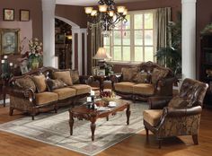 a living room filled with furniture and a chandelier