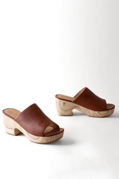 Open-toe clog sandal with a solid wood platform in an eye-catching pattern. 80 mm heel, 30 mm platform Platform made from sustainably sourced wood Leather upper, lining and sole Responsibly handmade in Peru Wooden Clogs, Platform Clogs, Clog Sandals, Nordstrom Store, Anniversary Sale, Platform Sandals, Peru, Open Toe, Clogs