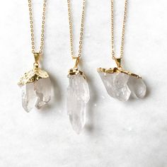 "Beautiful, real quartz crystal chunks turned in to pendants. These are extra quality druzy geode pieces, with gorgeous, gemmy, well formed crystals. They are not too heavy and are easy to wear. They have been gold plated and they are strung on a gold plated chain. You will receive the exact pendant of your choice. The chain length is customizable from 16\"-36\". Each pendant is approximately 1.5 - 2 inches long, but because each is a unique, natural product there is some variation. Jewelry from Raw Stone Crystal Pendant Necklace Gift, Raw Quartz Stone Pendant Necklace, Spiritual Quartz Pendant Jewelry, Gift Crystal Pendant Necklace With Raw Stone, Quartz Raw Stone Healing Necklaces, Quartz Pendant Necklaces With Raw Stone, Quartz Raw Stone Pendant Necklace, Quartz Crystal Necklace With Raw Stone For Healing, Minimalist Mineral Crystal Pendant Necklaces