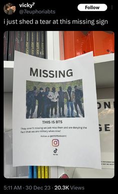 a missing poster posted on a shelf in a library with other books behind it and the caption that reads, i just shed a tear at this missing sign