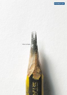 a pencil that has been made to look like it is in the shape of a castle