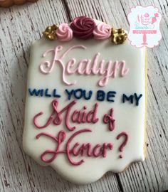 a decorated cookie with the words reallyn will you be my maid and her?