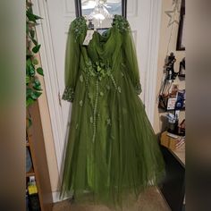 Green Hebeos Tulle Dress With Back Lacing Closure On Top And Zipper Closure On Skirt. Skirt Is 3 Layers Of Tulle And 1 Layer Of Satin. New With Tags Never Worn. Custom Sized Measurements; Bust; 40" Waist; 35" Hips; 43" Hollow To Hem; 52" Green Floor-length Tulle Dress, Forest Dress, Green Tulle, Dresses Green, Tulle Gown, Green Forest, Skirt Skirt, 3 Layers, Tulle Dress