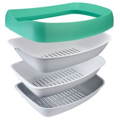 three white and green plastic containers stacked on top of each other with one lid open