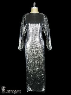 "BIG NEWS After 22 years, our website, TheFROCK.com, has had a makeover. Check out the new site, and join our mailing list for new arrivals.  Dazzling vintage Louis Feraud gown in the most incredible super soft silvery gray textile with a nearly furry pile. Lined. Rear asking slit. Rear invisible zipper. Measures about 34\" at bust, 30\" at waist, hips 37\", length 55.5\", and sleeve length 23.5\". Condition is excellent.  Layaway is available. ALL DELIVERY DATES mentioned by Etsy are ESTIMATES, Gown Long Sleeve, Louis Feraud, Dress Silver, Vintage Fur, Big News, Halloween Sale, Silver Dress, Mailing List, New Instagram