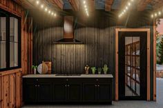 an image of a kitchen with lights on the ceiling and wood paneling around it