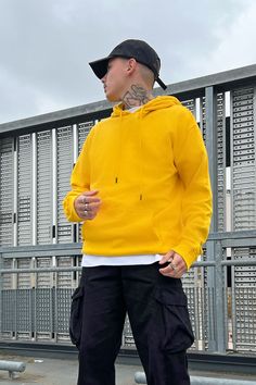 Available In Black, Heathered Grey, White, Navy, Red, Orange, Pink, Blue, And Yellow Hood With Drawstring Long Sleeve Kangaroo Pocket Ribbing On Cuffs And Hem 80% Cotton 20% Polyester Imported | Mens Tyson Hoodie in Yellow size XL by Fashion Nova Yellow Top Outfit, Hoodie Outfit Men, Bright Colored Outfits, Yellow Pants, Street Style Outfits Men, Black Dress Outfits, Yellow Hoodie, Yellow Outfit, Button Down Shirt Mens