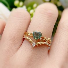 Wrap your fingers in the never-ending love that you deserve with our Everlasting Moss Agate Ring. This heart-shaped moss agate ring is adorned with round gems that gleam through a twisted leafy band. Evoking a natural elegance, a timeless charm doesn't get much sweeter than this. ✦ Available in both 14K yellow gold vermeil (14K yellow gold plated over a sterling silver base) and 10K solid yellow gold. Core Outfits, Moss Agate Jewelry, Magical Stones, Moss Agate Ring, Gold Vermeil Jewelry, Lucky Stone, Vermeil Jewelry, Agate Ring, Moss Agate