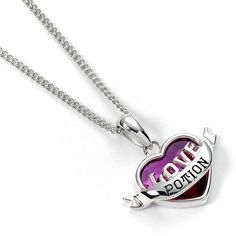 a heart shaped necklace with the words love is forever on it