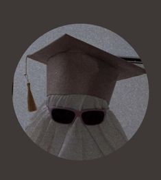 a graduation cap with sunglasses and a tassel