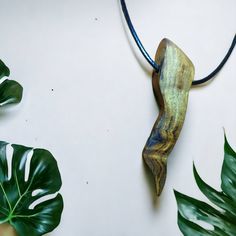 Unique carved oak wood necklace ethnic jewelry original gift  - essence of oak picked up in France in the forest of dompierre sur yon 🏞️ - waxed leather necklace with stainless steel lobster clasp 🎗️ - the wood and sand 5 times until the grain of 500, glossy effect and really very soft to the touch 😇 - the wood and then nourishes with linseed oil, known for its miracle effects on the wood! It is a transparent, non-film-forming product, which will coat the fibers of the wood and penetrate it d Earthy Wood Jewelry As Gift, Earthy Wood Jewelry Gift, Earthy Wooden Jewelry Gift, Unique Wooden Necklace For Gift, Earthy Natural Wood Jewelry For Gifts, Natural Carved Nature-inspired Necklace, Artisan Natural Wood Pendant Necklace, Nature-inspired Carved Natural Necklace, Earthy Necklace With Natural Variations As A Gift