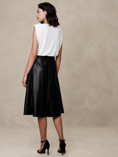 Vegan Leather Midi Skirt | Banana Republic Factory Sleek Knee-length Leather Skirt, Elegant Faux Leather Bottoms For Summer, Elegant Faux Leather Summer Bottoms, Leather Knee-length Lined Skirt, Faux Leather Workwear Skirt With Lining, Chic Leather Pleated Skirt, Chic Leather Skirt For Work, Faux Leather Lined Skirt For Work, Chic Knee-length Faux Leather Skirt