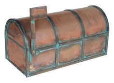 an old rusted metal mailbox is shown on a white background with clippings