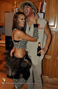 a man and woman dressed up as zombies