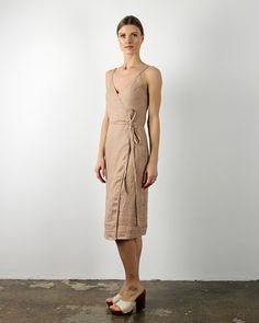 "FABRIC: 100% Softened Lithuanian Linen COLOR: Please choose the desired color from the side menu. STYLE: Knee-length linen wrap dress with adjustable spaghetti straps. SIZE CHART: 2 US/ 6 AU/ 34 EU: Bust 31.5\" (80 cm) , Waist 23\" (59 cm), Hips 35\" (88 cm) 4 US/ 8 AU/ 36 EU: Bust 33\" (84 cm) , Waist 25\" (63,5 cm), Hips 36\" (92 cm) 6 US/ 10 AU/ 38 EU: Bust 35\" (88 cm) , Waist 26,5\" (67,5 cm), Hips 38\" (96 cm) 8 US/ 12 AU/ 40 EU: Bust 36\" (92 cm), Waist 28\" (72 cm), Hips 39\"(100 cm) 10 Fitted Beige Belted Summer Dress, Fitted Beige Belted Dress For Summer, Linen Wrap Dress With Belt, Fitted Wrap Dress With Wrap-around Straps, Beige Wrap Dress With Tie Waist, Beige Linen Dresses With Adjustable Straps, Beige Midi Dress With Surplice Neckline For Summer, Beige Linen Dress With Tie Straps, Fitted Summer Wrap Dress With Tie Fastening