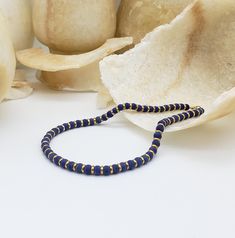 We used frosted lapis beads and 18K gold plated brass accent beads in this jewelry for a unique look. The gold beads are lacquered for a long-lasting finish. The necklace is 16 inches long with a lobster claw closure. This jewelry will come shipped in a box with a descriptive card. Matching bracelet: https://museumreproductions.etsy.com/listing/1493796567 Matching earrings: The striking combination of bright, blue lapis lazuli and polished gold was as favored by the ancient Sumerians as it was by the Egyptians. The Sumerians inhabited lower Mesopotamia between the Tigris and Euphrates rivers from the middle of the 4th millennium B.C. until about 1792 B.C. They learned early on how to shape gold, silver, copper, and bronze into useful objects. Necklaces, other jewelry, boxes, and statues ri Useful Objects, Lapis Lazuli Beads, Egyptian Jewelry, Blue Lapis Lazuli, Matching Bracelet, Blue Lapis, Matching Bracelets, Jewelry Boxes, Wholesale Jewelry