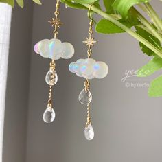 Celestial Rain Cloud Earrings Dangle - Fun white Cloud long drop earrings 🤍 Hypoallergenic 🌸 Handmade with love ✨ Cute & Dainty  🎁 Gift ready 〰️Click👇🏻 Find more Earrings🎀  https://www.etsy.com/shop/byYeeSo ◽️ PACKAGING ◽️  * The jewelry will be nicely packaged * Comes with a drawstring suede pouch * If you need personalized gift note, please click the link below, add it to your cart when check out to upgrade your packaging. https://www.etsy.com/listing/1008661207/upgrade-gift-packaging?re White Celestial Dangle Earrings, White Celestial Earrings For Gift, White Dangle Crystal Earrings With Pearl Drop, Celestial White Earrings, White Hypoallergenic Crystal Earrings For Party, White Hypoallergenic Drop Crystal Earrings, White Crystal Pearl Drop Earrings As Gift, White Long Drop Crystal Earrings For Party, White Minimalist Long Drop Earrings