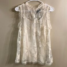 Who What Wear Cream Sheer Embossed Blouse With Camisole. Sleeveless, Size M. Nwt. Armpit To Armpit 20”, Waist 21”, Length 26”. This Is A Lovely Top! Feminine Lace Tank Top, Elegant Sleeveless Sheer Blouse, Spring Sheer Tank Camisole, Sleeveless Sheer Lace Tops, Chic Sleeveless Sheer Top, Casual Sheer Sleeveless Tops, Lace Vest Top For Spring, Feminine Lace Trim Sleeveless Blouse Tank Top, Feminine Sheer Sleeveless Camisole