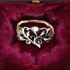 This wonderful early Georgian ring is known as a giardinetto/giardinetti (Italian for "little garden(s)"). These floral-themed rings reflect the mid 18th century taste for delicate, elegantly composed Rococo styles, a departure from the from the heavier and more ostentatious styles of earlier years. Giardinetti rings - sometimes fluid and asymmetrical, sometimes even and balanced - typically feature diamonds and small colored gemstones. These rare jewels were designed to compliment the floral fa