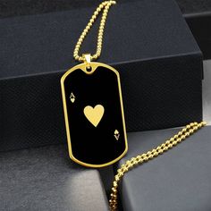 "This Ace of Hearts Necklace Is the Perfect Gift Whether for Yourself or a Loved One.  Explore all our Symbolic Jewelry here: https://www.etsy.com/in-en/shop/SymbolicPresent?ref=seller-platform-mcnav§ion_id=22069637 ➜ Our jewelry is made of high-quality surgical steel with a shatterproof liquid glass coating and an 18k gold finish option. ➜ Engrave onto the back of the Playing Card pendant your loved one's name, your wedding date, an anniversary, or anything else you want to remember and keep yo Vintage Necklaces For Valentine's Day Personalized Gift, Gold Heart Shaped Necklace For Father's Day, Personalized Black Heart Charm Jewelry, Personalized Black Heart-shaped Jewelry, Engraved Dog Tag Necklace For Valentine's Day, Black Necklace For Personalized Valentine's Day Gift, Black Necklace For Valentine's Day Personalized Gift, Amulet Charm, Ace Of Hearts