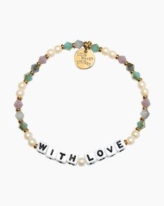 Add a pop of style and sentiment to your wrist with this stunning Little Words Project bracelet! Its eye-catching design and message spelled out in letter beads make it a great choice for your bracelet stack. Letter beads spell out "WITH LOVE" S/M size elastic stretch bracelet Hand-crafted beaded bracelet Plated brass hardware Handle with care - do not wet Due to the one-of-a-kind nature of the medium, exact colors and patterns may vary slightly from the image shown Little Words Project, Erin Gray, Love S, Trendy Bracelets, Shoes Sandals Heels, Love Bracelet, Letter Beads, Sneaker Heels, Love Bracelets