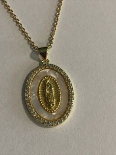 Gold Plated Nuestra Señora de Guadalupe. Virgen. Pendant Necklace w/ Pearl Inlay | eBay Gold Virgencita Necklace, Virgencita Necklace, Pearl Inlay, Catholic Jewelry, Oval Shape, Everyday Look, Gold Plate, Yellow Gold, Pendant Necklace